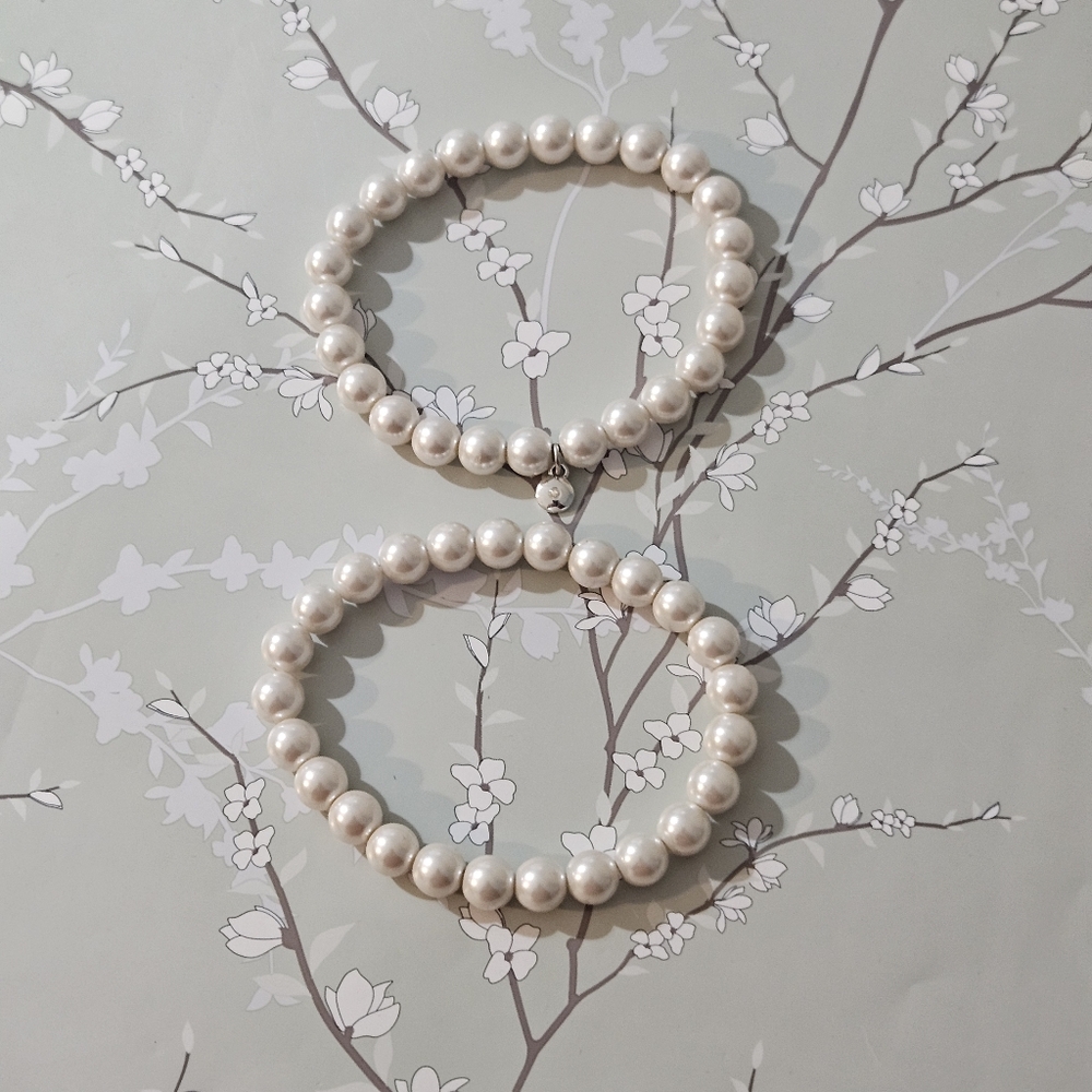 Two Roman RMN Pearl Bracelets